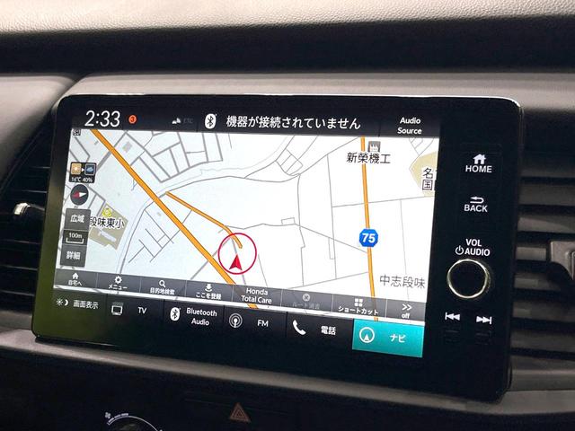 フィット e:HEVホーム 禁煙車 9インチナビ 全周囲カメラ 衝突被害軽減システム レーダークルーズ ハーフレザーシート ドラレコ コーナーセンサー スマートキー LEDヘッド ETC2.0 オートライト オートエアコン(32枚目)