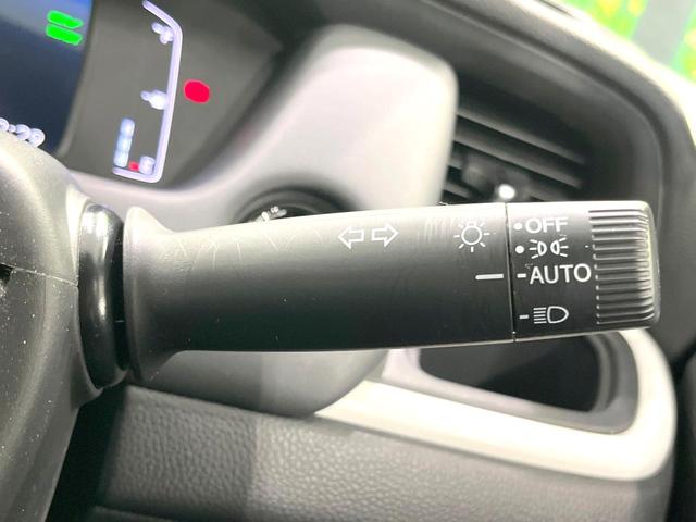 フィット e:HEVホーム 禁煙車 9インチナビ 全周囲カメラ 衝突被害軽減システム レーダークルーズ ハーフレザーシート ドラレコ コーナーセンサー スマートキー LEDヘッド ETC2.0 オートライト オートエアコン(56枚目)