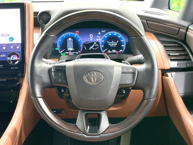 ヴェルファイアハイブリッド Ｚ　プレミア　禁煙車　左右独立ムーンルーフ　１４インチナビ付ディスプレイオーディオ　両側パワスラ　全周囲カメラ　電動リアゲート　デジタルインナーミラー　シートヒーター　シートベンチレーション　オットマン　ＢＳＭ（12枚目）