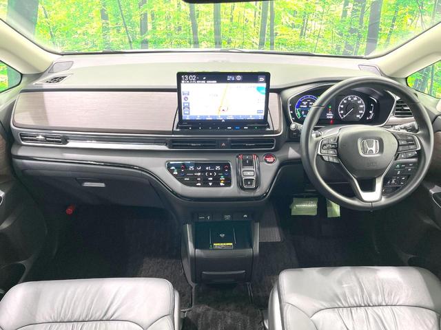 オデッセイハイブリッド e:HEVアブソルート・EX 禁煙車 両側電動ドア 純正11.4型ナビ 全周囲カメラ 衝突被害軽減システム レーダークルーズ BSM 電動リアゲート 黒レザーシート ドラレコ 前席中列シートヒーター パワーシート ビルトインETC(2枚目)