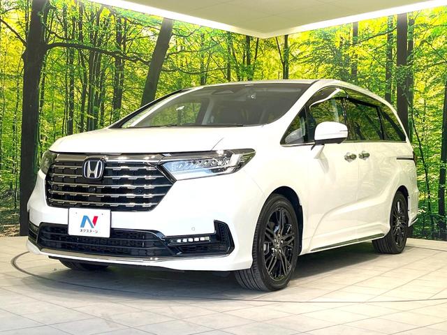 オデッセイハイブリッド e:HEVアブソルート・EX 禁煙車 両側電動ドア 純正11.4型ナビ 全周囲カメラ 衝突被害軽減システム レーダークルーズ BSM 電動リアゲート 黒レザーシート ドラレコ 前席中列シートヒーター パワーシート ビルトインETC(25枚目)