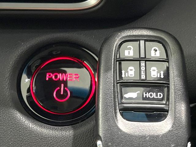 オデッセイハイブリッド e:HEVアブソルート・EX 禁煙車 両側電動ドア 純正11.4型ナビ 全周囲カメラ 衝突被害軽減システム レーダークルーズ BSM 電動リアゲート 黒レザーシート ドラレコ 前席中列シートヒーター パワーシート ビルトインETC(67枚目)