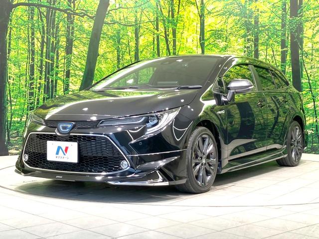 カローラツーリング ハイブリッド ダブルバイビー 禁煙車 モデリスタエアロ 純正9型ナビ デジタルインナミラー バックカメラ レーダークルーズ BSM ハーフレザーシート ドラレコ シートヒーター LEDヘッド ビルトインETC 純正17インチアルミ(66枚目)