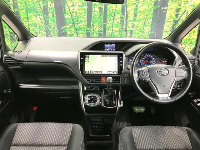 ヴォクシー ＺＳ　煌　純正１０型ナビ　両側電動ドア　後席モニター　バックカメラ　衝突被害軽減システム　禁煙車　コーナーセンサー　スマートキー　ＬＥＤヘッド　ＥＴＣ　クルコン　純正１６インチアルミ　オートハイビーム（2枚目）
