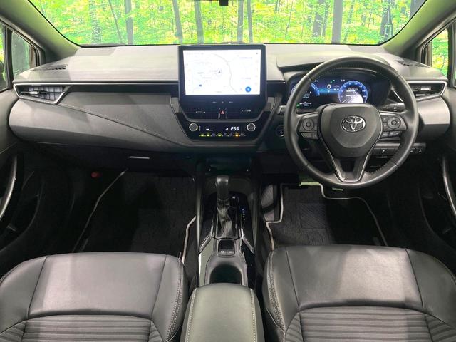 カローラツーリング ハイブリッド　ダブルバイビー　禁煙車　１０．５インチディスプレイオーディオ　バックカメラ　衝突被害軽減システム　レーダークルーズ　シートヒーター　ステアリングヒーター　コーナーセンサー　スマートキー　ＬＥＤヘッド　ＥＴＣ（2枚目）