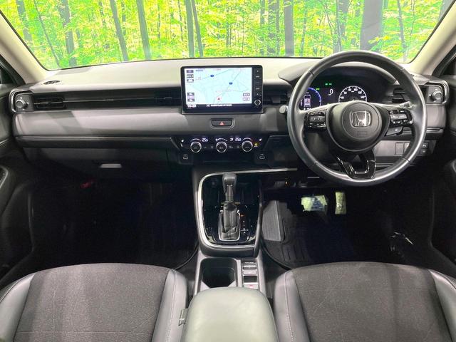 ヴェゼル ｅ：ＨＥＶ　Ｚ　禁煙車　純正９型ナビ　バックカメラ　衝突被害軽減システム　電動リアゲート　ハーフレザーシート　コーナーセンサー　スマートキー　ＬＥＤヘッド　ビルトインＥＴＣ　純正１８インチアルミ　車線逸脱警報（2枚目）