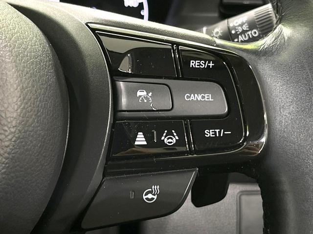 ヴェゼル ｅ：ＨＥＶ　Ｚ　禁煙車　純正９型ナビ　バックカメラ　衝突被害軽減システム　電動リアゲート　ハーフレザーシート　コーナーセンサー　スマートキー　ＬＥＤヘッド　ビルトインＥＴＣ　純正１８インチアルミ　車線逸脱警報（5枚目）