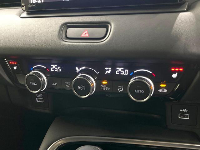 ヴェゼル ｅ：ＨＥＶ　Ｚ　禁煙車　純正９型ナビ　バックカメラ　衝突被害軽減システム　電動リアゲート　ハーフレザーシート　コーナーセンサー　スマートキー　ＬＥＤヘッド　ビルトインＥＴＣ　純正１８インチアルミ　車線逸脱警報（7枚目）