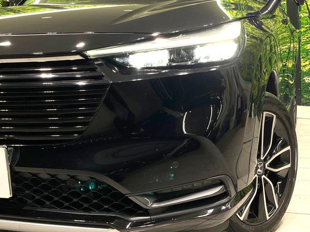 ヴェゼル ｅ：ＨＥＶ　Ｚ　禁煙車　純正９型ナビ　バックカメラ　衝突被害軽減システム　電動リアゲート　ハーフレザーシート　コーナーセンサー　スマートキー　ＬＥＤヘッド　ビルトインＥＴＣ　純正１８インチアルミ　車線逸脱警報（12枚目）