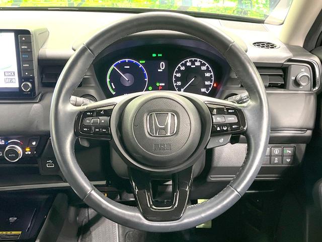 ヴェゼル ｅ：ＨＥＶ　Ｚ　禁煙車　純正９型ナビ　バックカメラ　衝突被害軽減システム　電動リアゲート　ハーフレザーシート　コーナーセンサー　スマートキー　ＬＥＤヘッド　ビルトインＥＴＣ　純正１８インチアルミ　車線逸脱警報（13枚目）