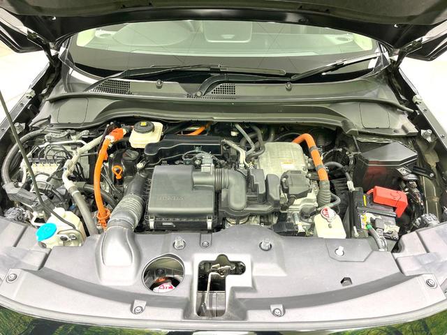 ヴェゼル ｅ：ＨＥＶ　Ｚ　禁煙車　純正９型ナビ　バックカメラ　衝突被害軽減システム　電動リアゲート　ハーフレザーシート　コーナーセンサー　スマートキー　ＬＥＤヘッド　ビルトインＥＴＣ　純正１８インチアルミ　車線逸脱警報（19枚目）