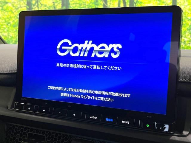 ステップワゴン ｅ：ＨＥＶスパーダ　禁煙車　純正１１．４インチナビ　両側電動ドア　バックカメラ　衝突被害軽減システム　電動リアゲート　シートヒーター　ハーフレザーシート　コーナーセンサー　ＬＥＤヘッド　車線逸脱警報　オートライト（4枚目）