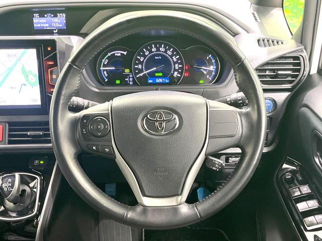 ヴォクシー ハイブリッドＺＳ　煌　禁煙車　モデリスタエアロ　１０インチナビ　バックカメラ　フリップダウンモニター　両側パワスラ　セーフティセンス　シートヒーター　クルコン　Ｗエアコン　オートライト　ドラレコ　オートハイビーム　ＥＴＣ（12枚目）
