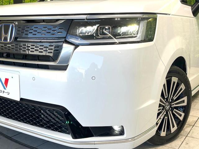 ステップワゴン ｅ：ＨＥＶスパーダ　プレミアムライン　禁煙車　現行　純正１１型ＳＤナビ　全周囲カメラ　純正１５型後席モニター　パワーバックドア　衝突被害軽減ブレーキ　レーダークルーズコントロール　フルセグＴＶ　Ｂｌｕｅｔｏｏｔｈ接続　ＬＥＤヘッドライト（16枚目）