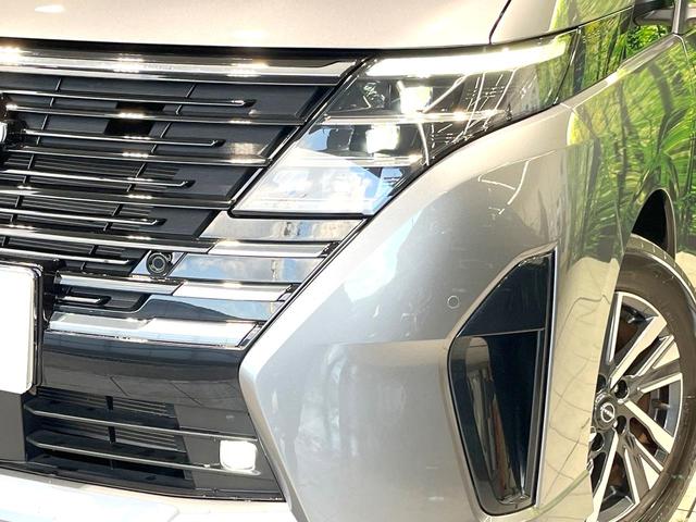 セレナ ハイウェイスターV 禁煙車 現行 メーカー純正12型ナビ 全周囲カメラ 後席モニター プロパイロット 前席シートヒーター 衝突被害軽減ブレーキ 両側パワースライドドア オートエアコン LEDヘッドライト ETC(17枚目)