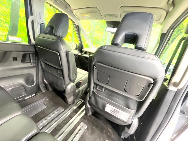 セレナ ハイウェイスターV 禁煙車 現行 メーカー純正12型ナビ 全周囲カメラ 後席モニター プロパイロット 前席シートヒーター 衝突被害軽減ブレーキ 両側パワースライドドア オートエアコン LEDヘッドライト ETC(31枚目)