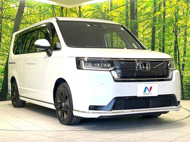 ステップワゴン ｅ：ＨＥＶスパーダ　禁煙車　両側電動ドア　後席モニター　純正１１．４型ナビ　バックカメラ　衝突被害軽減システム　レーダークルーズ　ＢＳＭ　電動リアゲート　ハーフレザー　前席シートヒーター　ドラレコ　コーナーセンサー（17枚目）