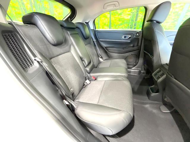 ヴェゼル ｅ：ＨＥＶ　Ｚ　登録済未使用車　純正８型ナビ　全周囲カメラ　衝突被害軽減システム　レーダークルーズ　ＢＳＭ　電動リアゲート　ハーフレザー　前席シートヒーター　ＬＥＤヘッド　ビルトインＥＴＣ　純正１８インチＡＷ（9枚目）