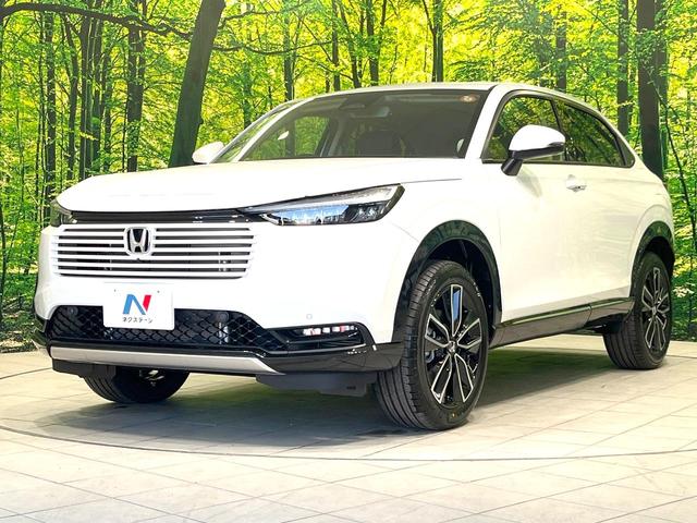 ヴェゼル ｅ：ＨＥＶ　Ｚ　登録済未使用車　純正８型ナビ　全周囲カメラ　衝突被害軽減システム　レーダークルーズ　ＢＳＭ　電動リアゲート　ハーフレザー　前席シートヒーター　ＬＥＤヘッド　ビルトインＥＴＣ　純正１８インチＡＷ（24枚目）