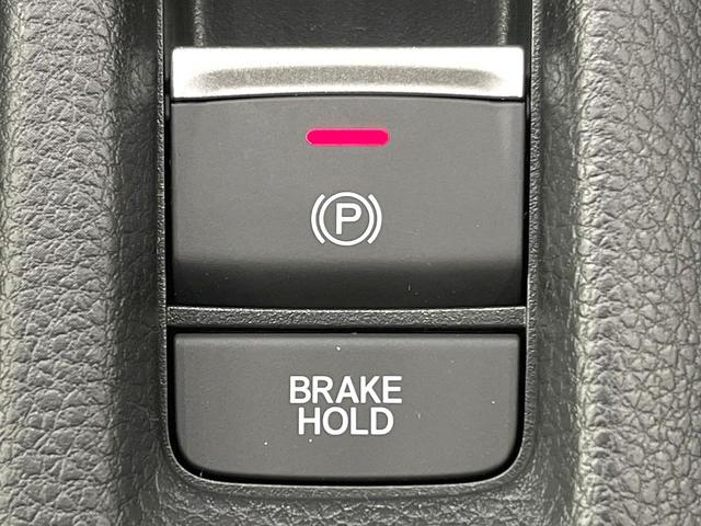 ヴェゼル ｅ：ＨＥＶ　Ｚ　登録済未使用車　純正８型ナビ　全周囲カメラ　衝突被害軽減システム　レーダークルーズ　ＢＳＭ　電動リアゲート　ハーフレザー　前席シートヒーター　ＬＥＤヘッド　ビルトインＥＴＣ　純正１８インチＡＷ（60枚目）