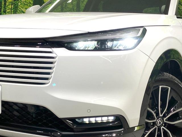 ヴェゼル ｅ：ＨＥＶ　Ｚ　登録済未使用車　９インチコネクトナビ　全周囲カメラ　衝突被害軽減システム　電動リアゲート　ハーフレザーシート　コーナーセンサー　スマートキー　ＬＥＤヘッド　ＥＴＣ２．０　純正１８インチアルミ（12枚目）