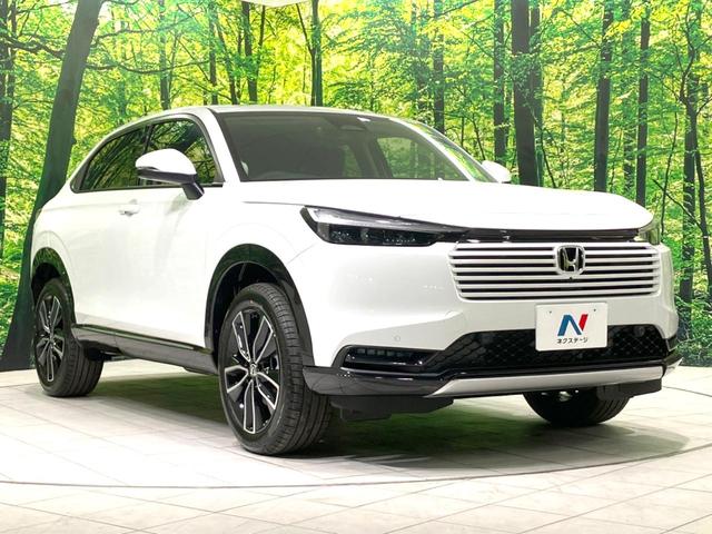 ヴェゼル ｅ：ＨＥＶ　Ｚ　登録済未使用車　９インチコネクトナビ　全周囲カメラ　衝突被害軽減システム　電動リアゲート　ハーフレザーシート　コーナーセンサー　スマートキー　ＬＥＤヘッド　ＥＴＣ２．０　純正１８インチアルミ（16枚目）