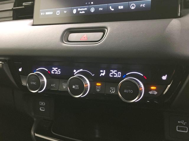 ヴェゼル ｅ：ＨＥＶ　Ｚ　登録済未使用車　９インチコネクトナビ　全周囲カメラ　衝突被害軽減システム　電動リアゲート　ハーフレザーシート　コーナーセンサー　スマートキー　ＬＥＤヘッド　ＥＴＣ２．０　純正１８インチアルミ（39枚目）