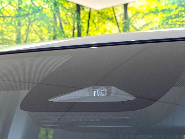 シエンタ ハイブリッドZ 禁煙車 両側電動ドア 純正10.5型ナビ 全周囲カメラ 100V電源 衝突被害軽減システム レーダークルーズ BSM LEDヘッド ドラレコ ETC2.0 オートハイビーム 車線逸脱警報 オートライト(32枚目)