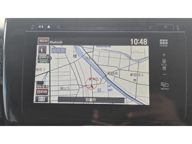 ステップワゴン Ｇ　ＥＴＣ　バックカメラ　ナビ　オートクルーズコントロール　両側電動スライドドア　スマートキー　電動格納ミラー　３列シート　ウォークスルー　ＣＶＴ　ＣＤ　ＵＳＢ　盗難防止システム　衝突安全ボディ　ＡＢＳ（4枚目）