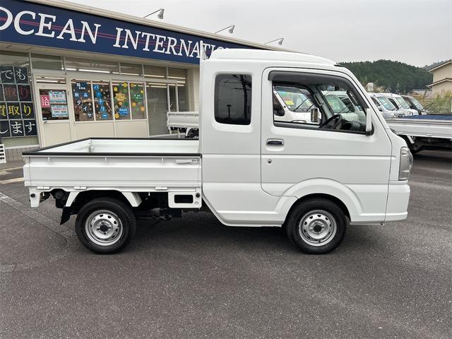 スーパーキャリイ Ｘ　４ＷＤ　軽トラック　ＭＴ　ナビ　キーレスエントリー　エアコン　パワーステアリング　パワーウィンドウ　運転席エアバッグ　助手席エアバッグ（4枚目）
