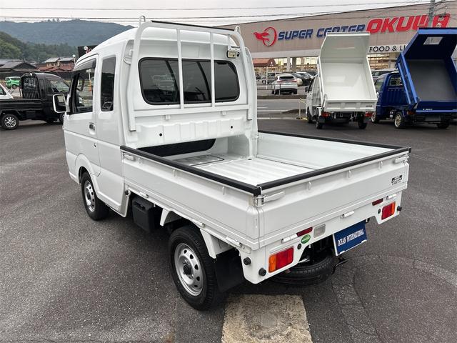 スーパーキャリイ Ｘ　４ＷＤ　軽トラック　ＭＴ　ナビ　キーレスエントリー　エアコン　パワーステアリング　パワーウィンドウ　運転席エアバッグ　助手席エアバッグ（7枚目）