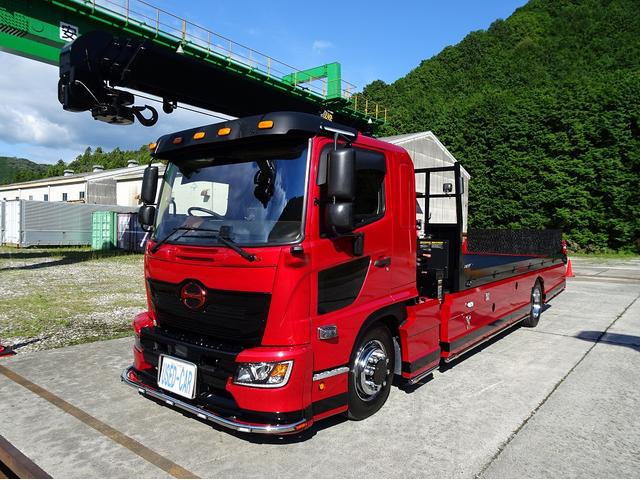 ヒノレンジャー 　増トン　４段セルフクレーン付　スライドローダー　一般型　６．４トン積載　横根太増し　標準幅　ベッド付　５．９ｍ長ボディ　油圧式リヤゲート　２６０馬力（3枚目）