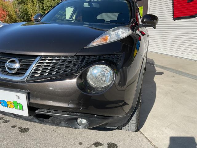 ジューク １５ＲＳ　タイプＶ　純正ナビ・ワンセグＴＶ・ハンズフリー・ＥＴＣ・社外１６インチアルミホイール・オートリトラミラー・スマートキー・プッシュスタート・プライバシーガラス（13枚目）