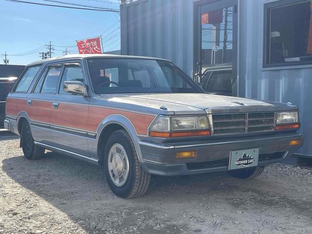 グロリアワゴン ＧＬ　５ＭＴ　ナルディウッドステアリング　買取車両　デジタルインナーミラー　木目調サイドデカール　純正ホイール　ユピテルセキュリティ　レザー調革張り　３列７人乗り　ＥＴＣ　電動格納ミラー　エアコン（13枚目）