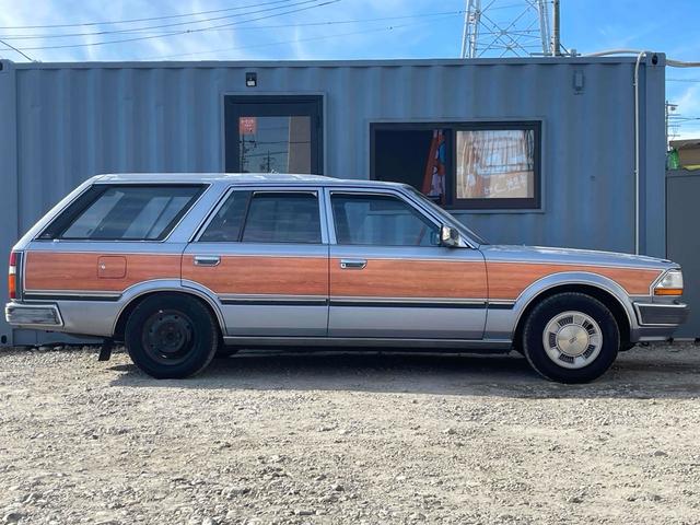 グロリアワゴン ＧＬ　５ＭＴ　ナルディウッドステアリング　買取車両　デジタルインナーミラー　木目調サイドデカール　純正ホイール　ユピテルセキュリティ　レザー調革張り　３列７人乗り　ＥＴＣ　電動格納ミラー　エアコン（14枚目）