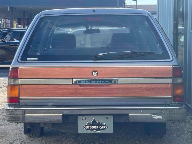 グロリアワゴン ＧＬ　５ＭＴ　ナルディウッドステアリング　買取車両　デジタルインナーミラー　木目調サイドデカール　純正ホイール　ユピテルセキュリティ　レザー調革張り　３列７人乗り　ＥＴＣ　電動格納ミラー　エアコン（15枚目）