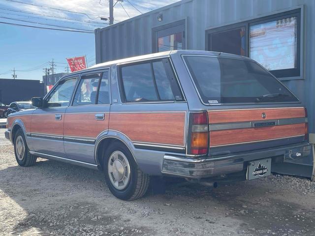 グロリアワゴン ＧＬ　５ＭＴ　ナルディウッドステアリング　買取車両　デジタルインナーミラー　木目調サイドデカール　純正ホイール　ユピテルセキュリティ　レザー調革張り　３列７人乗り　ＥＴＣ　電動格納ミラー　エアコン（16枚目）