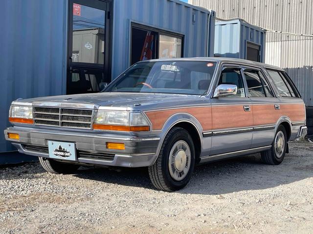 グロリアワゴン ＧＬ　５ＭＴ　ナルディウッドステアリング　買取車両　デジタルインナーミラー　木目調サイドデカール　純正ホイール　ユピテルセキュリティ　レザー調革張り　３列７人乗り　ＥＴＣ　電動格納ミラー　エアコン（18枚目）