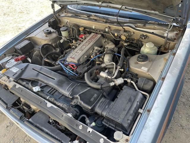 グロリアワゴン ＧＬ　５ＭＴ　ナルディウッドステアリング　買取車両　デジタルインナーミラー　木目調サイドデカール　純正ホイール　ユピテルセキュリティ　レザー調革張り　３列７人乗り　ＥＴＣ　電動格納ミラー　エアコン（21枚目）