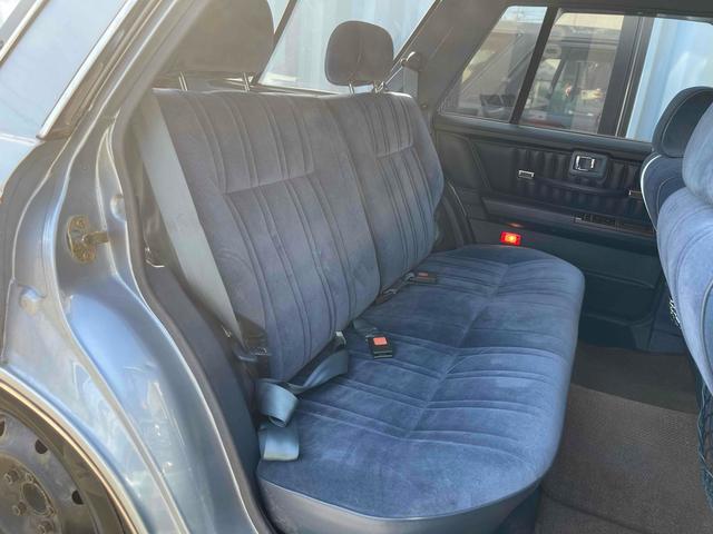 グロリアワゴン ＧＬ　５ＭＴ　ナルディウッドステアリング　買取車両　デジタルインナーミラー　木目調サイドデカール　純正ホイール　ユピテルセキュリティ　レザー調革張り　３列７人乗り　ＥＴＣ　電動格納ミラー　エアコン（24枚目）