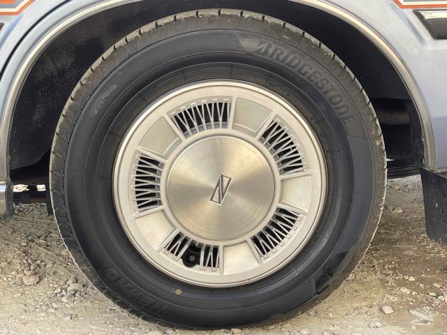 グロリアワゴン ＧＬ　５ＭＴ　ナルディウッドステアリング　買取車両　デジタルインナーミラー　木目調サイドデカール　純正ホイール　ユピテルセキュリティ　レザー調革張り　３列７人乗り　ＥＴＣ　電動格納ミラー　エアコン（26枚目）