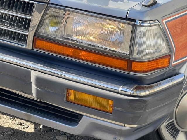 グロリアワゴン ＧＬ　５ＭＴ　ナルディウッドステアリング　買取車両　デジタルインナーミラー　木目調サイドデカール　純正ホイール　ユピテルセキュリティ　レザー調革張り　３列７人乗り　ＥＴＣ　電動格納ミラー　エアコン（31枚目）