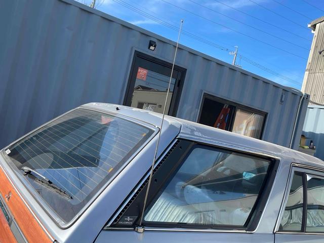 グロリアワゴン ＧＬ　５ＭＴ　ナルディウッドステアリング　買取車両　デジタルインナーミラー　木目調サイドデカール　純正ホイール　ユピテルセキュリティ　レザー調革張り　３列７人乗り　ＥＴＣ　電動格納ミラー　エアコン（67枚目）