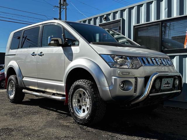 デリカD:5 G プレミアム ボディリフトアップ ガナドールマフラー シートカバー ナビ 後席モニター Bカメラ 両側パワスラ クルコン 社外AW 7人乗り ETC スマートキー HID サイドステップ 電動リアゲート シートH(19枚目)