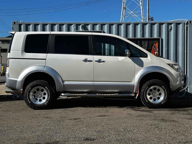 デリカD:5 G プレミアム ボディリフトアップ ガナドールマフラー シートカバー ナビ 後席モニター Bカメラ 両側パワスラ クルコン 社外AW 7人乗り ETC スマートキー HID サイドステップ 電動リアゲート シートH(21枚目)