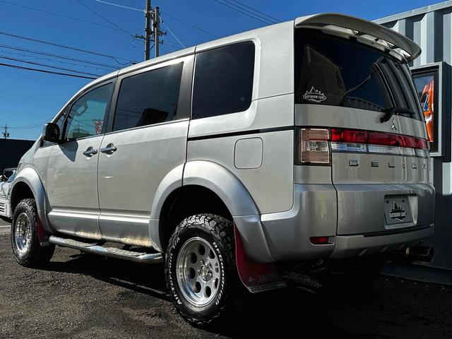 デリカD:5 G プレミアム ボディリフトアップ ガナドールマフラー シートカバー ナビ 後席モニター Bカメラ 両側パワスラ クルコン 社外AW 7人乗り ETC スマートキー HID サイドステップ 電動リアゲート シートH(24枚目)