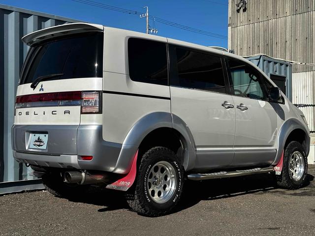 デリカD:5 G プレミアム ボディリフトアップ ガナドールマフラー シートカバー ナビ 後席モニター Bカメラ 両側パワスラ クルコン 社外AW 7人乗り ETC スマートキー HID サイドステップ 電動リアゲート シートH(25枚目)