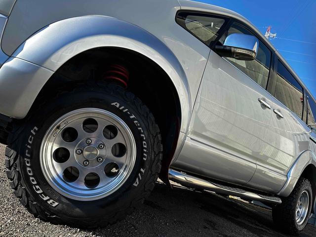 デリカD:5 G プレミアム ボディリフトアップ ガナドールマフラー シートカバー ナビ 後席モニター Bカメラ 両側パワスラ クルコン 社外AW 7人乗り ETC スマートキー HID サイドステップ 電動リアゲート シートH(28枚目)