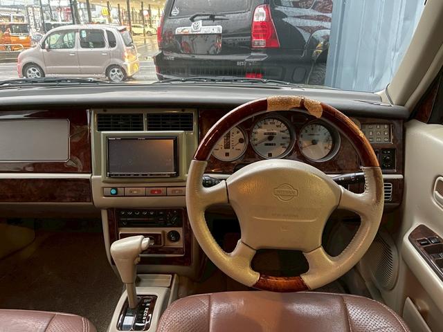 ラシーン ｆｔ　タイプＩＩ　ユーザー買取車・ストラーダＳＤナビ・フルセグＴＶ・Ｂｌｕｅｔｏｏｔｈ・バックカメラ・新品バッテリー・丸目ヘッドライト・ＡＷ・木目調パネル・ブラウンシートカバー・背面タイヤレス仕様・フォグライト・４ＷＤ（44枚目）