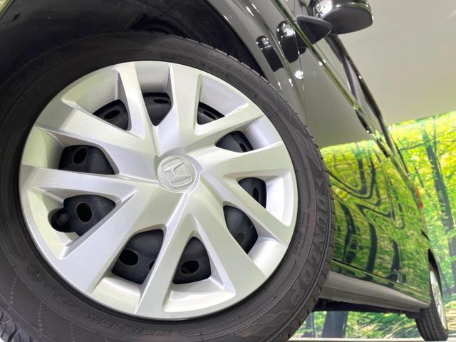 Ｎ－ＢＯＸ Ｌ　禁煙車　後期　両側電動ドア　純正ナビ　サイド／カーテンエアバック　ホンダセンシング　バックカメラ　アダプティブクルコン　コーナーセンサー　ＥＴＣ　ＬＥＤヘッド　シートヒーター　シートバックテーブル（13枚目）